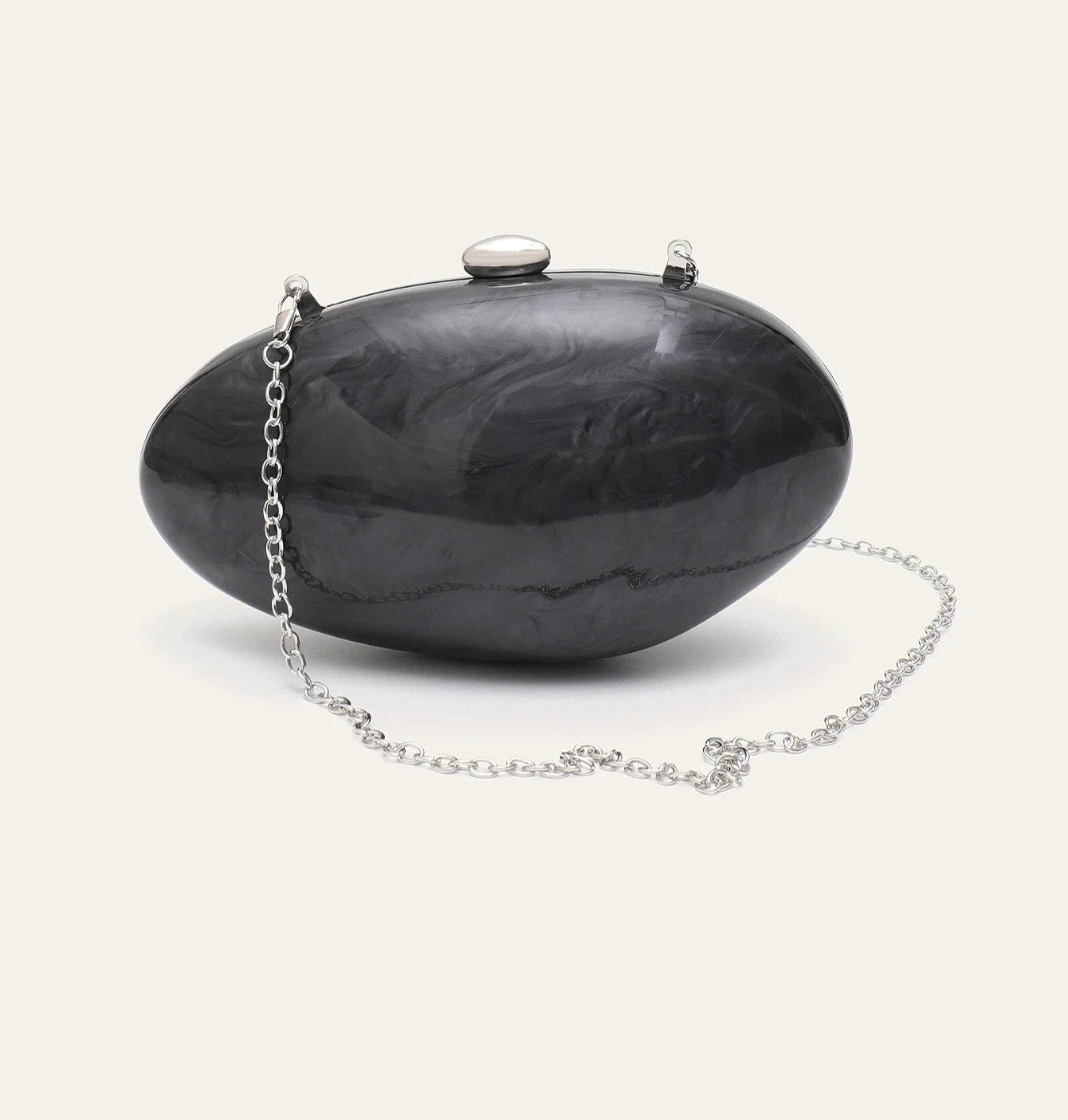 Bolsa Clutch Madrepérola – A Joia da Sua Produção